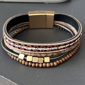 Mixed material multi strand bracelet